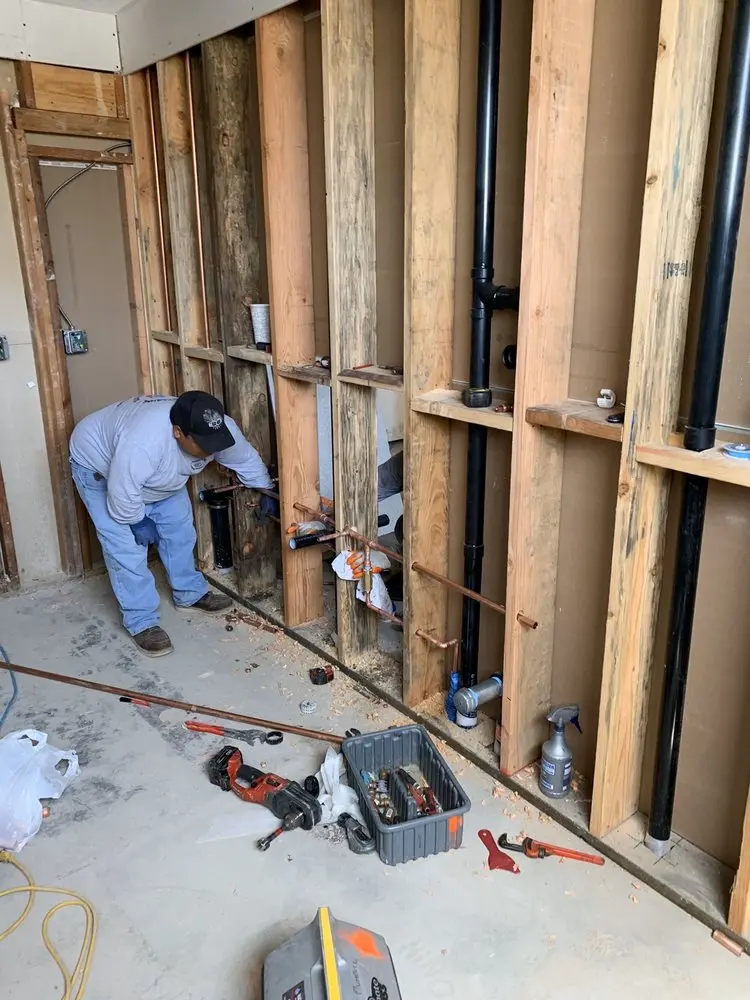 Commercial rough-in plumbing for Water Heater Replacement in College